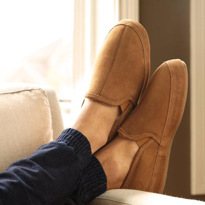 Men's Wool-Lined Romeo Slippers on figure kicking feet up off couch