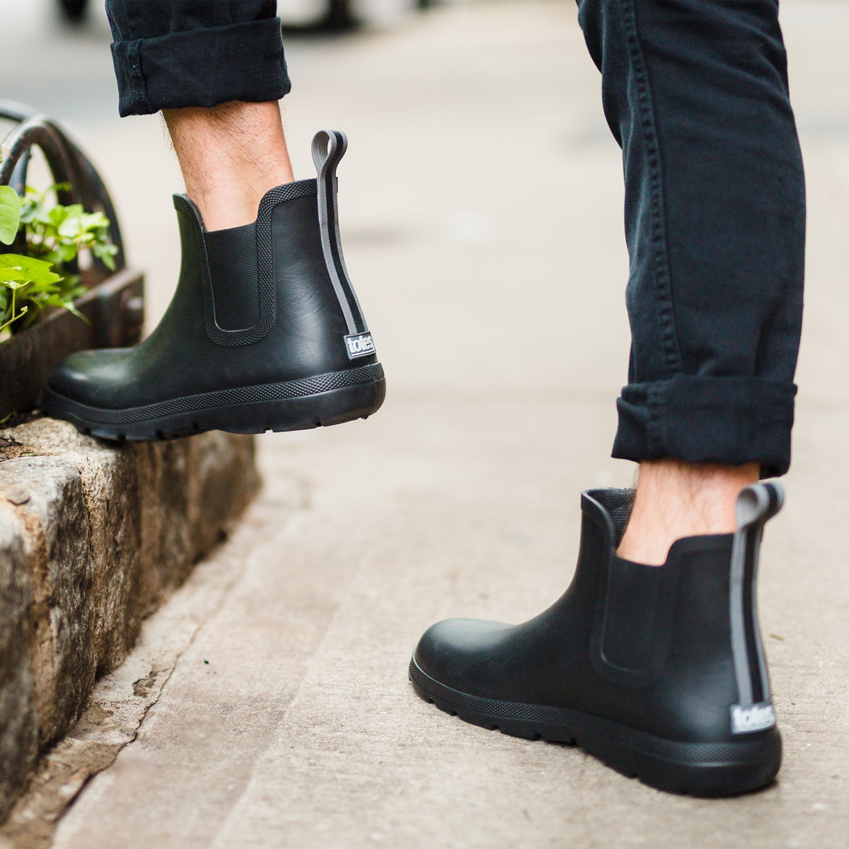 Cirrus™ Men's Chelsea Ankle Rain Boot in Black On Model Outside